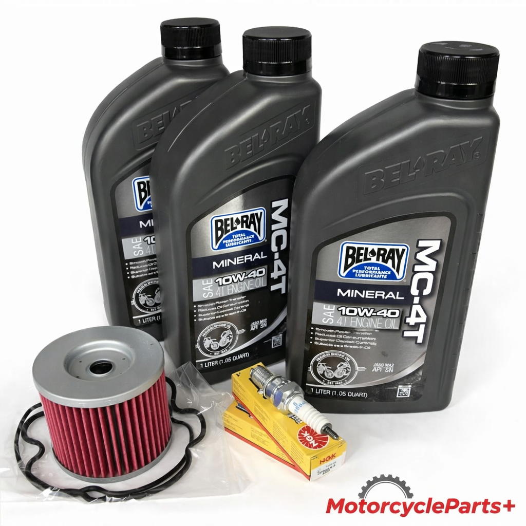 Suzuki GS500 89‑Up oil change tune‑up kit with BelRay 10W‑40 MC‑4T oil bottles, HiFloFiltro oil filter, and NGK DPR8EA‑9 spark plugs